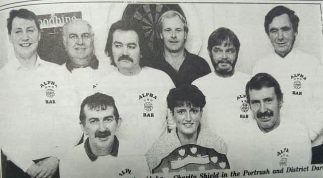 Members of the Alpha Bar Darts team, winners of the Bass Perpetual Charity Shield in the Portrush and District Darts League in 1993.