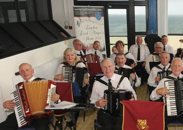 Baillies Mills Accordion Band pictured after entertaining day trippers and holiday makers at a free concert in Newcastle Centre on Sunday 30th July.