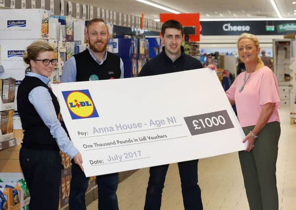 Gillian Thompson (right) from Anna House receives a cheque for Â£1,000 from Lidl employees Barry McConville (Store Manager), Danielle Hamilton and Ross MacDonald.
