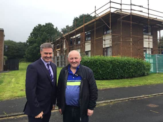 Paul Frew MLA and Councillor Reuben Glover viewing the roof replacement work. INBT 31-701-CON