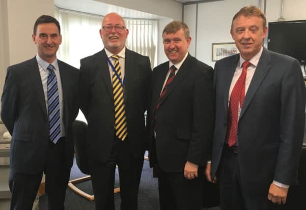 North Antrim MLA Mervyn Storey (second from right) meeting with education chiefs.
