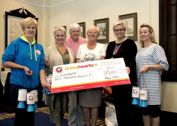 Pictured at the presentation of a cheque from the Mayor's Charity to BraveheartsNI are: Clare and Bernie Caulfield, Edwina Steele, Martha McIlwaine, Betty McConnell and former Mayor Cllr Audrey Wales.
