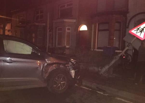 The car came to a halt after striking two parked cars, a number of walls and a lamppost.
