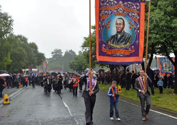 The banner of Donalds Purple Heros LOL No 517 on parade. INLT 29-031-PSB