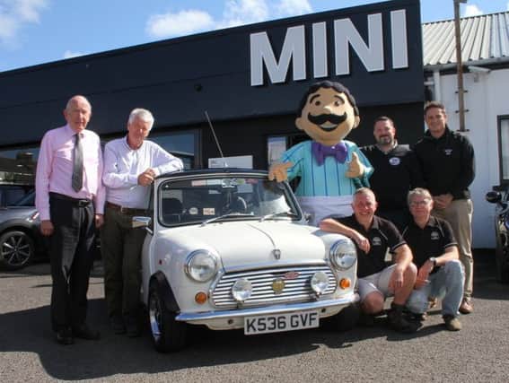 Pictured at the launch event are (from left) Jack Cassidy, MD JKC Mini; Brian Moore, compere; Mr Morrelli; Arnaldo Morelli, sponsor; David McKelvey, JKC Mini. Kneeling - Jimmy Callan and Andy Shaw, Causeway Coast Mini Club.