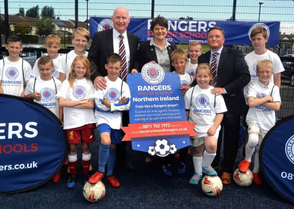 Rangers legend John Brown (left) with Arlene Foster and Gary Gibson of Rangers Soccer School. Photo: Tony Hendron/Tonypixnews