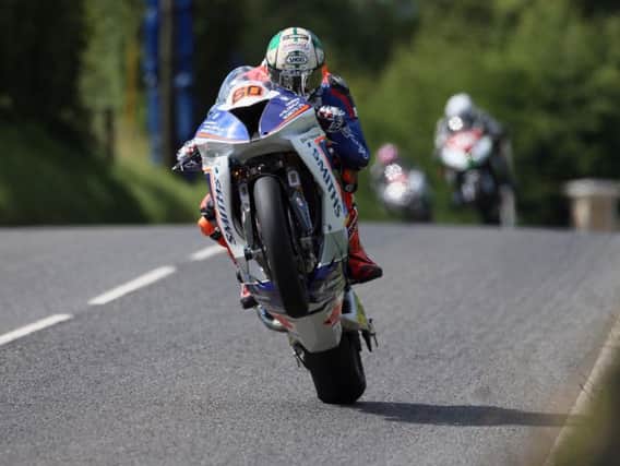 Peter Hickman set the only 132mph lap on day one at the MCE Ulster Grand Prix as the Smiths Racing rider topped the times in three classes.