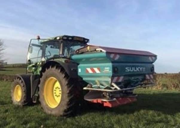 The stolen tractor and fertiliser sower.