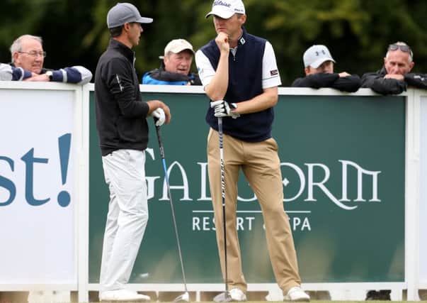 Michael Hoey and Chase Koepka

 talk on the first tee at Galgorm