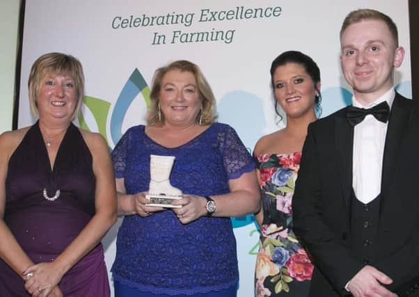 Lorna Robinson pictured with Maureen Currie (Danske Bank), Laura Martin (Farming Life), and Connor McCloy (Creagh Concrete) after receiving her Woman of Excellence award