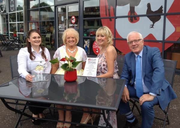 Beef and Bird Manager Jessica Gibson, Silver Social entertainer Valerie Kirkpatrick, Beef and Bird owner Bronagh Campbell and Alderman Allan Ewart MBE.