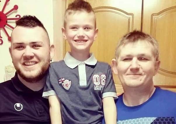 Lisburn man Gary Wilson (right), who was tragically killed in a car crash on Monday morning, with his son Gary and grandson Christian.