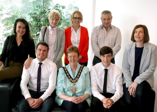 Life Savers Nathaniel Hunter and Jordan Donnelly received a Civic Reception from the Mayor of Causeway Coast and Glens Borough Council Cllr Joan Baird today after saving the lives of three young children in Ballycastle earlier in August.They are pictured with their families Amy Hunter, Margaret Kerrigan,Ciir Cara McShane Paul Kerrigan and Marice Kerrigan  .PICTURE KEVIN MCAULEY/MCAULEY MCAULEY MULTIMEDIA