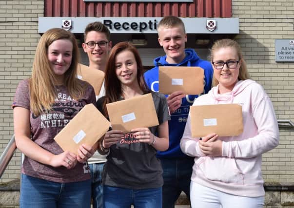 A level results at Cullybackey College - back row L-R - Steven McLeister, Paul Young. Front row L-R - Gillian Gillespie, Jeannie Balmer, Catherine Backus