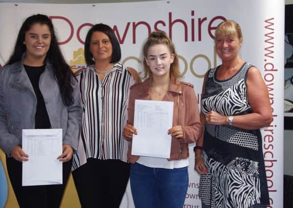 Downshire students Kirsty Caldwell and Megan Dunne received their A-level results from Downshire principal Mrs Stewart. Kirsty achieved grades B, B, B and is pictured with her mum. Megan achieved grades A, A and B