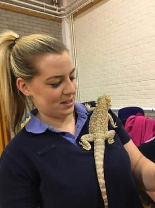Lucy Kirkwood has fun with reptiles - so many experiences to be enjoyed with Girlguiding!