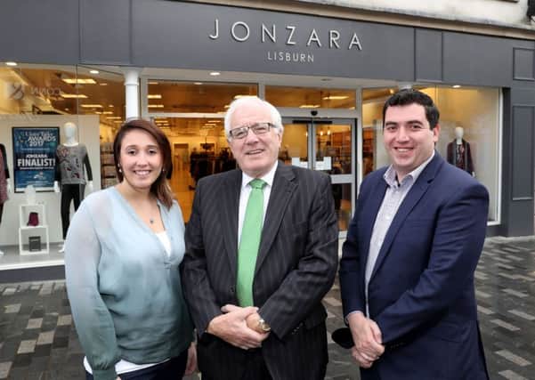 Jonathan and Sarah McCann, directors of Jonzara, with Alderman Allan Ewart MBE (centre), chairman of the council's Development Committee.