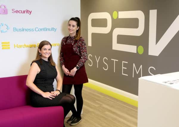 P2V Systems Service Manager Ann Marie O'Neill (seated) with SERC graduate Bronagh Keenan. Pic by Stephen Davison