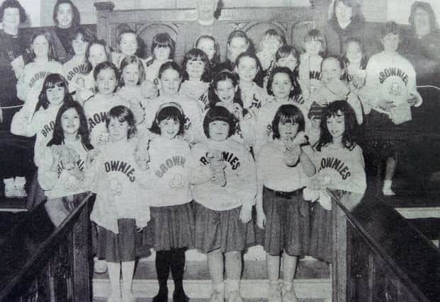3rd Portstewart Brownie Pack who held a clean-up of Agherton Parish Church after a sleepover in the Guide Hall in 1993.