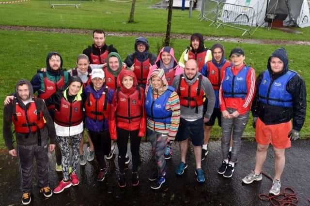 Drenched but determined - all ready for Ballymoney Rotary Club's Dragon Boat races.