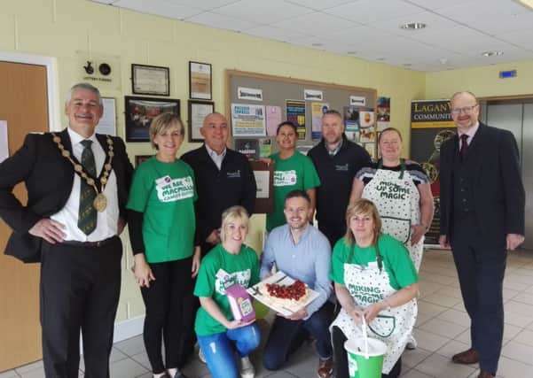 Robbie Butler MLA, Cllr Tim Mitchell and Mayor Tim Morrow with representatives of the Resurgam Trust and organisers of the coffee morning fundraiser in Laganview Enterprise Centre.
