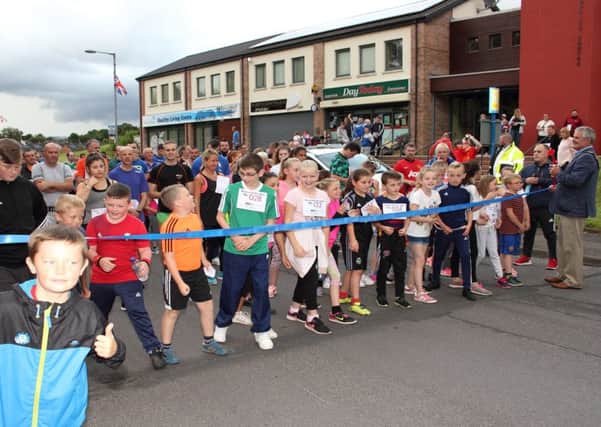 Runners line up for the start of the Resurgam Fun Run in the Old Warren area of Lisburn. The race was started by Mayor Tim Morrow.