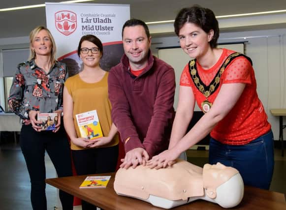 Chair of Mid Ulster District Council, Councillor Kim Ashton is pictured practising her CPR skills at Ranfurly House. Also pictured are Mid Ulster District Council Staff, Philip Mitchell (Exercise Referral Coordinator and CPR Trainer, Cookstown Leisure Centre) and Helena Quinn and Catherine McKenna (Health and Wellbeing, Environmental Health).