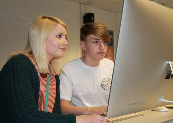Talented young designer  Matthew McLaughlin (17) who has qualified for the finals of the prestigious WorldSkills competition in Graphic Design. He is pictured with NRC lecturer Laura Dixon.