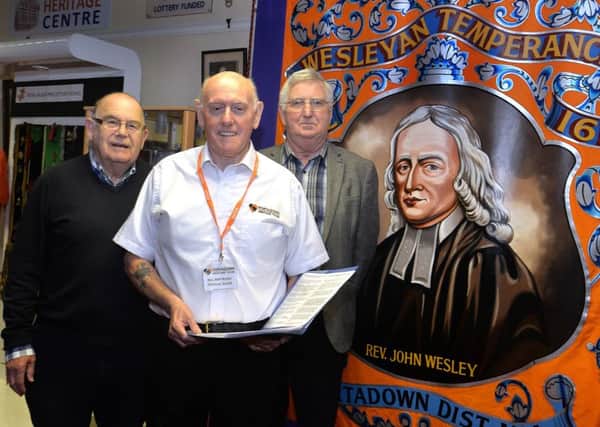 Tour guides for the Orange Heritage Week visits to Carleton St Orange Hall, from left, Cardwell McClure, project organiser, Bill Partridge and Billy McClean. INPT38-219.