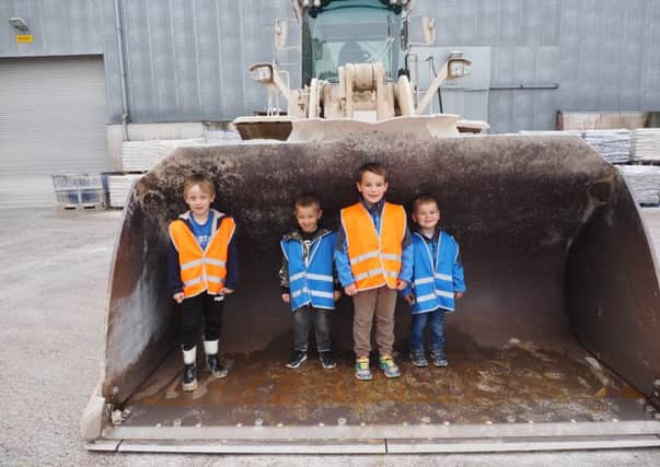How's that for a scoop? The sheer scale of equipment delighted these lads who visited Kilwaughter Minerals.