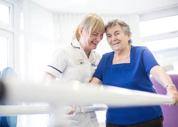Physiotherapist Mary Armstrong with Mary Martin. Photography credit Brian Morrison/Marie Curie