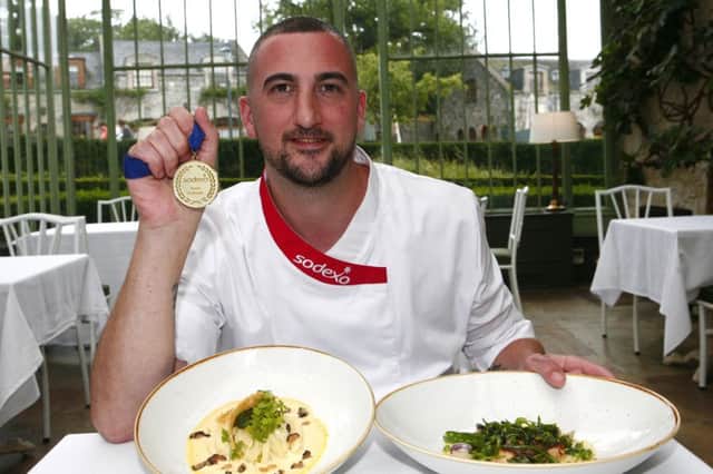 Lisburn man Nicky Reid, head chef for Sodexo at Almac, Craigavon is the company's 2017 All-Ireland Chef of the Year.He will represent Ireland in the UK and Ireland Grand Final early next year.