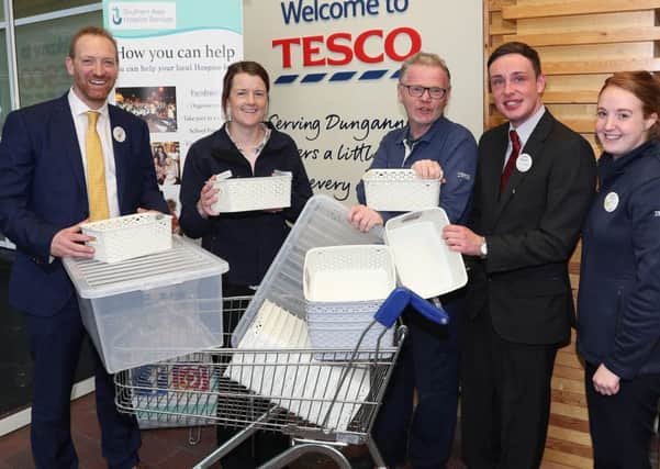 Graham Agnew, Tesco Dungannon Store Manager; Anne Mac Oscar of Southern Area Hospice; and Paul Bayne, Darren Mallon and Nicola Dobson of Tesco Dungannon