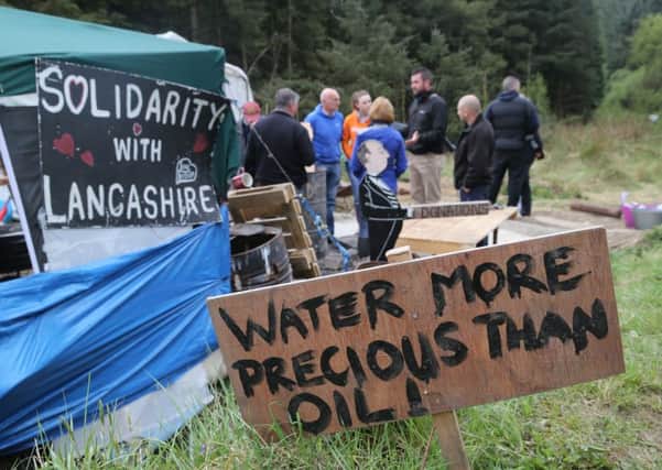 Campaigners protesting against an oil drilling operation at Woodburn Forest in Carrickfergus last year