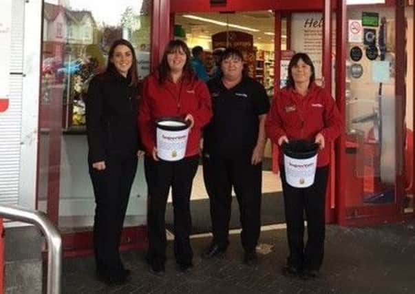 Staff at the SuperValu store in Dromore are raising funds to buy life-saving defibrillators for local schools. Pictured are Emma Harrison, Jayne Trimble, Karen Long and Gillian Gibson.