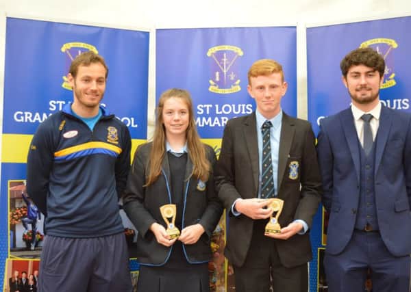 Sporting Endeavour Award - Maeve Mulholland and Rory McCloskey with Mr Henry and Ryan McFadden at the St Louis Grammar Junior Prize-Giving.