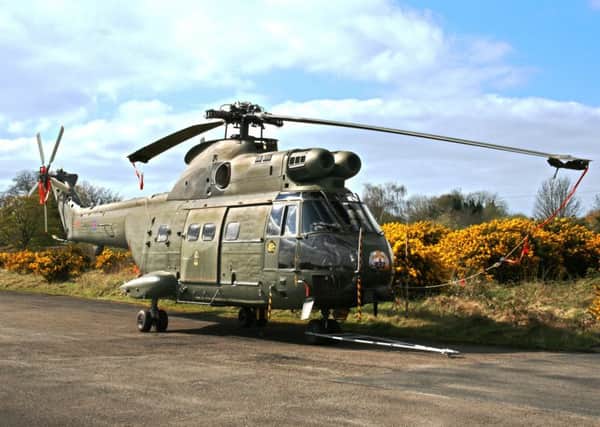 A Puma helicopter outside the hangars of the Ulster Aviation Society (UAS) at the Maze/Long Kesh site, Lisburn.  It's one of 35 aircraft in the Society's collection, which is open for group tours most of the year.