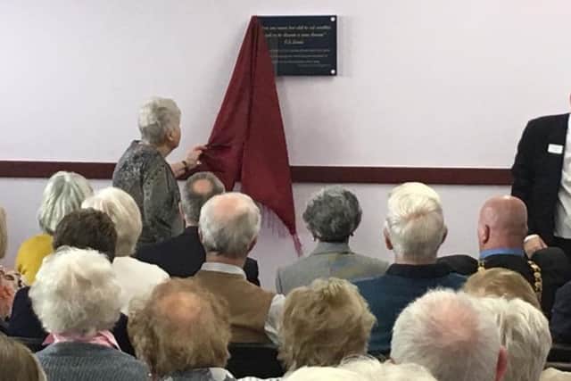 Unveiling the plaque at the official opening of the new premises. INCT 40-747-CON