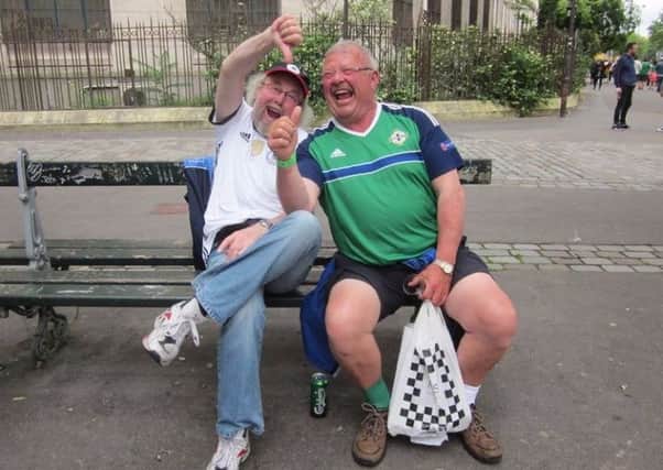 German fan Werner and Northern Ireland fan Neil in Paris during Euro 2016
