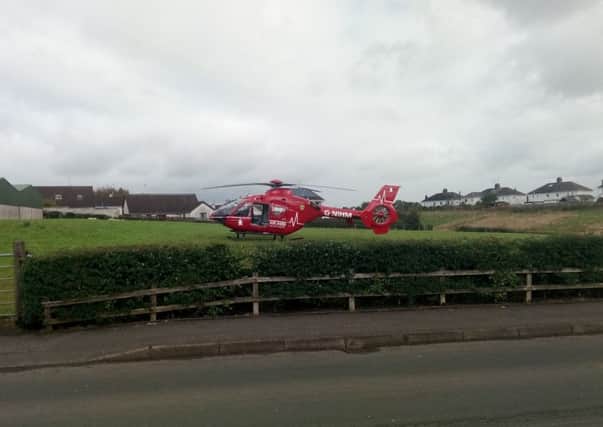 Air Ambulance landed in  a field off the Carniny Road around 1.45pm