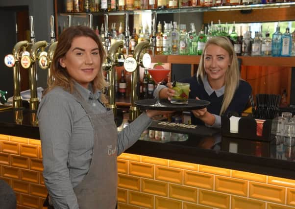 Gemma Kidd, Manager of The Cardan Bar & Grill, with waitress Eimear McCullough.