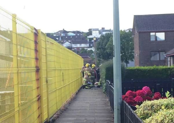 Fire Service attending the sudden death incident at Seacourt, Larne today.