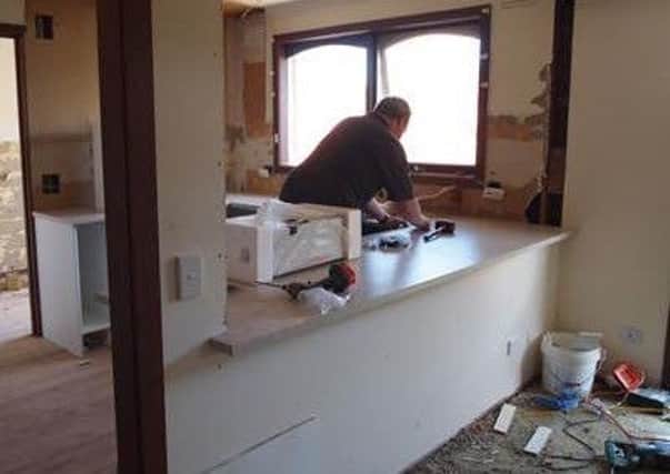 Work is ongoing on installing new kitchens and bathrooms in north Lurgan