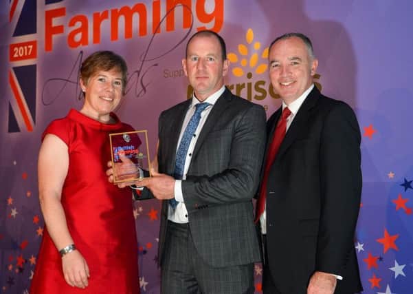 Bryan Wilson (Centre) pictured at the British Farming Awards with Emma Penny, Briefing Media Agriculture and Richard Phelps, ABP Food Group.