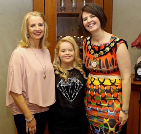 Chair of Mid Ulster District Council, Councillor Kim Ashton meets aspiring young model from Cookstown Kate Grant and her mother Deirdre.