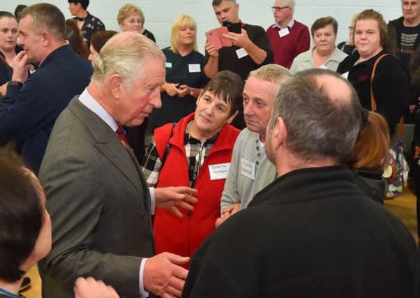 Prince Charles pictured at Eglinton Community Centre were he met with victims of the recent flooding as well as community groups and emergengy services from the local area involved in the storm clean up. Photo by Simon Graham Photography