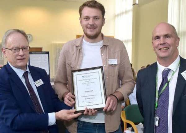 Stephen Bell, from Carnmoney, Co.Antrim, won the prize for best display representing research at the DAERA Postgraduate Seminar. Stephen has just started the final year of his PhD funded by DAERA and is investigating the sustainability of the local honey bee population. Photo Simon Graham