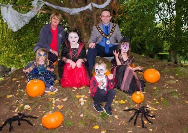 Mayor of Antrim and Newtownabbey, Councillor Paul Hamills is joined by L-R Jacqui Kirkwood-Hamill The Junction, Pixie, Leah, Jack & Dani for the launch of the Halloween programme.