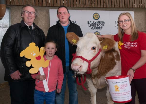 Shaun Irvine, Ballymena Livestock Market, joins Grace Powell, Richard Powell, and Lynn Cowan, Children's Heartbeat Trust, at the launch of the fundraising auctions