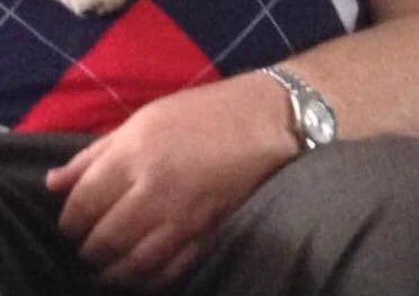 The Rolex watch that was taken during the burglary.